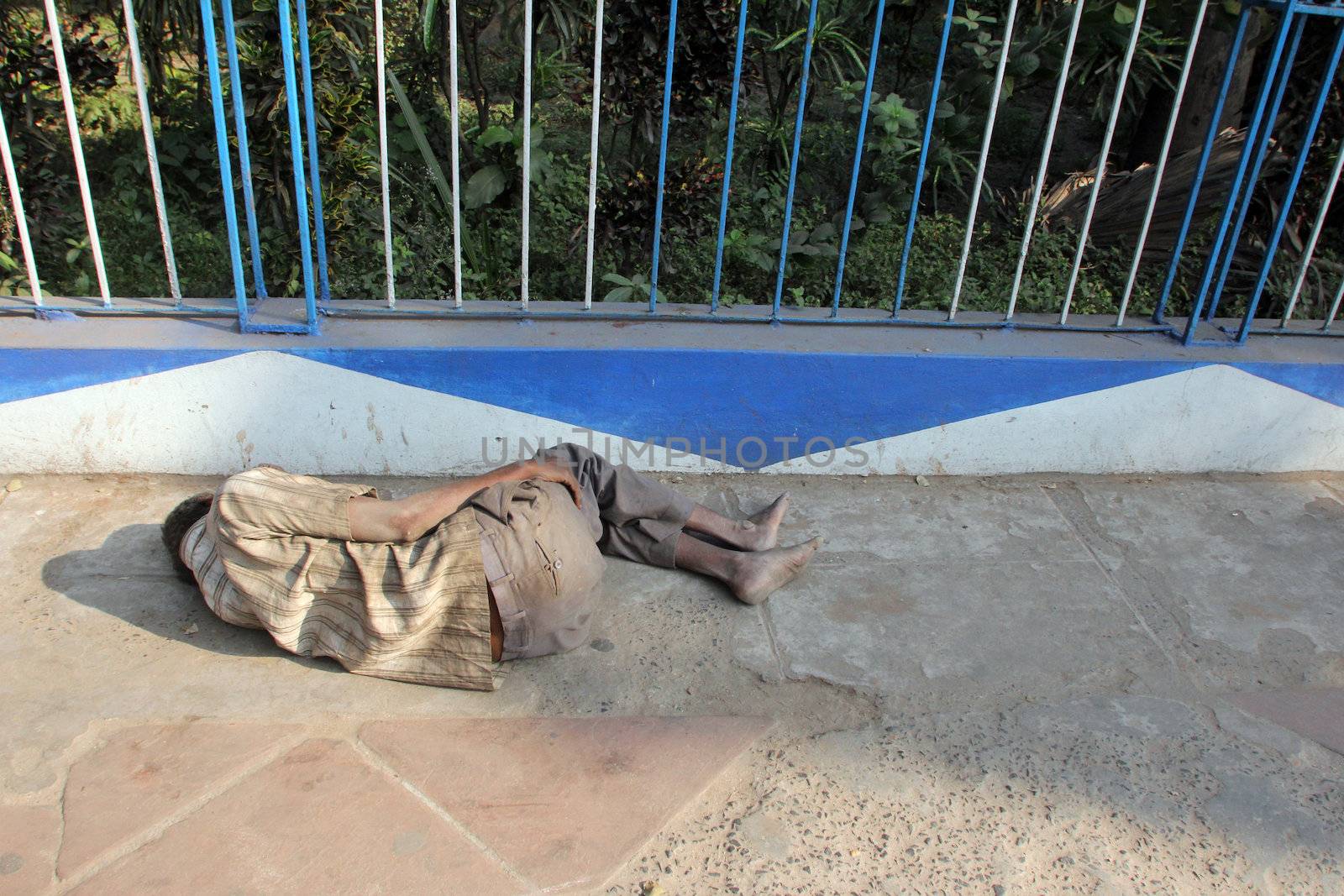 Homeless people sleeping on the footpath of Kolkata. on November 25, 2012 in Kolkata, India.