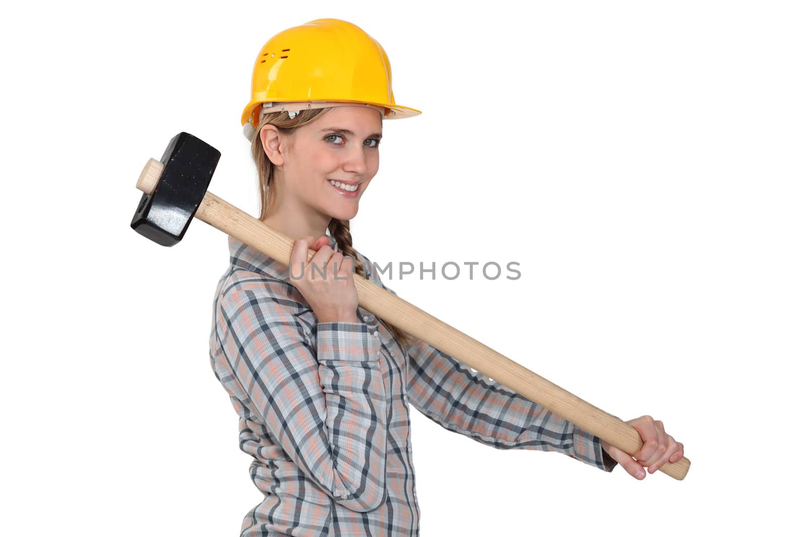 craftswoman holding a huge hammer