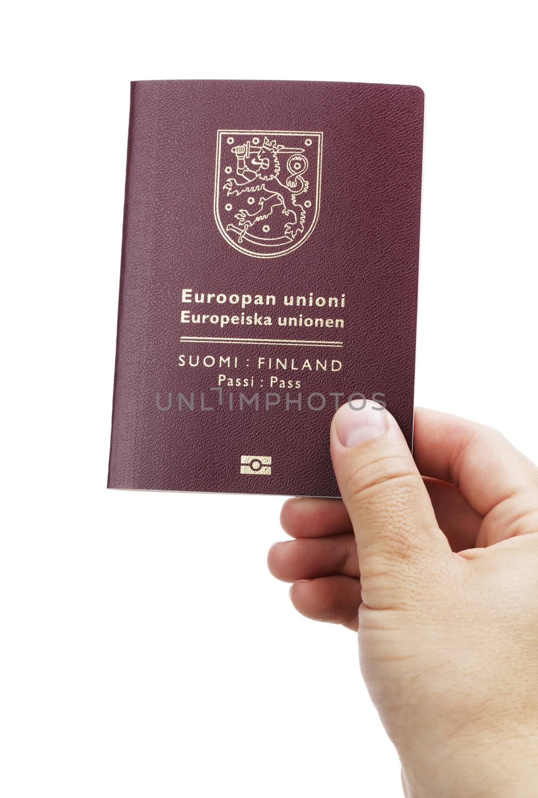Man holding a Finnish (Finland) passport ih his hand. This is the new (2013) of the passport.