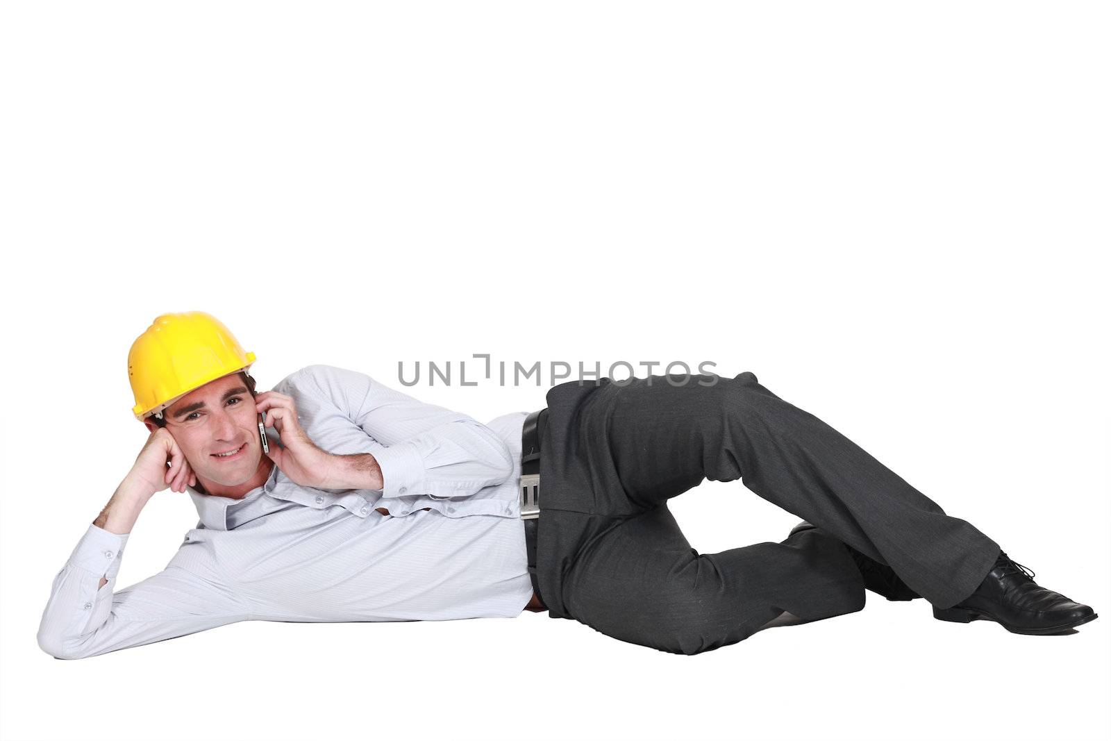 Engineer lying on the floor by phovoir