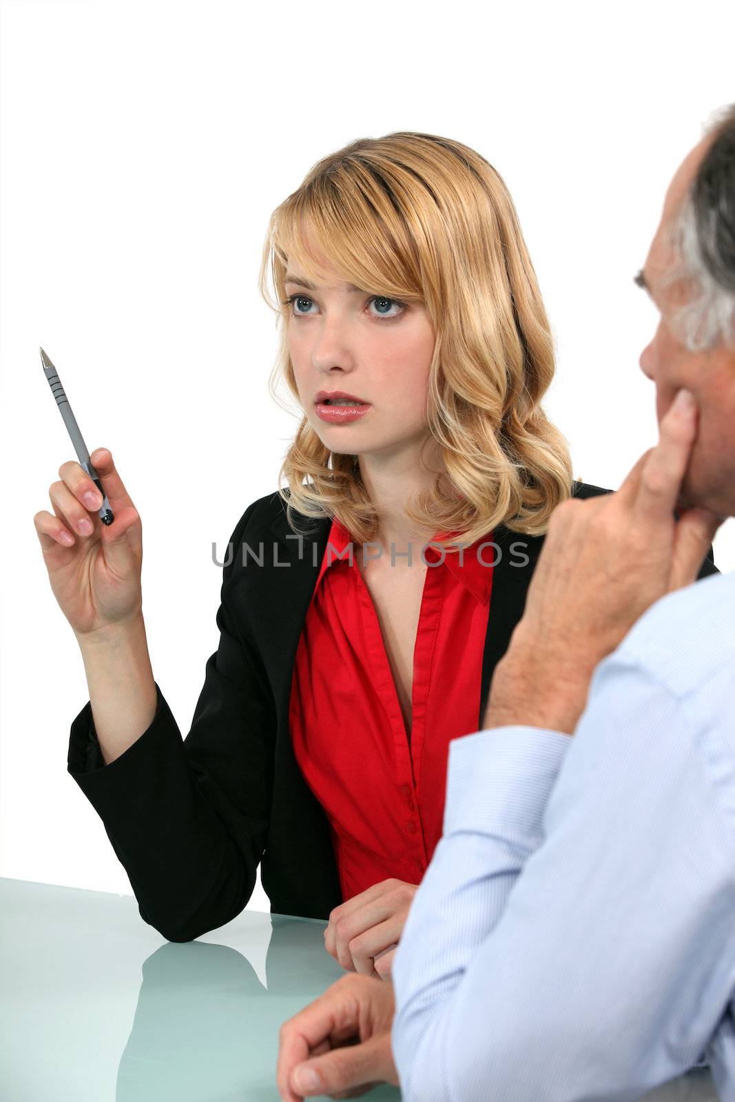 Female employee and boss having a meeting by phovoir