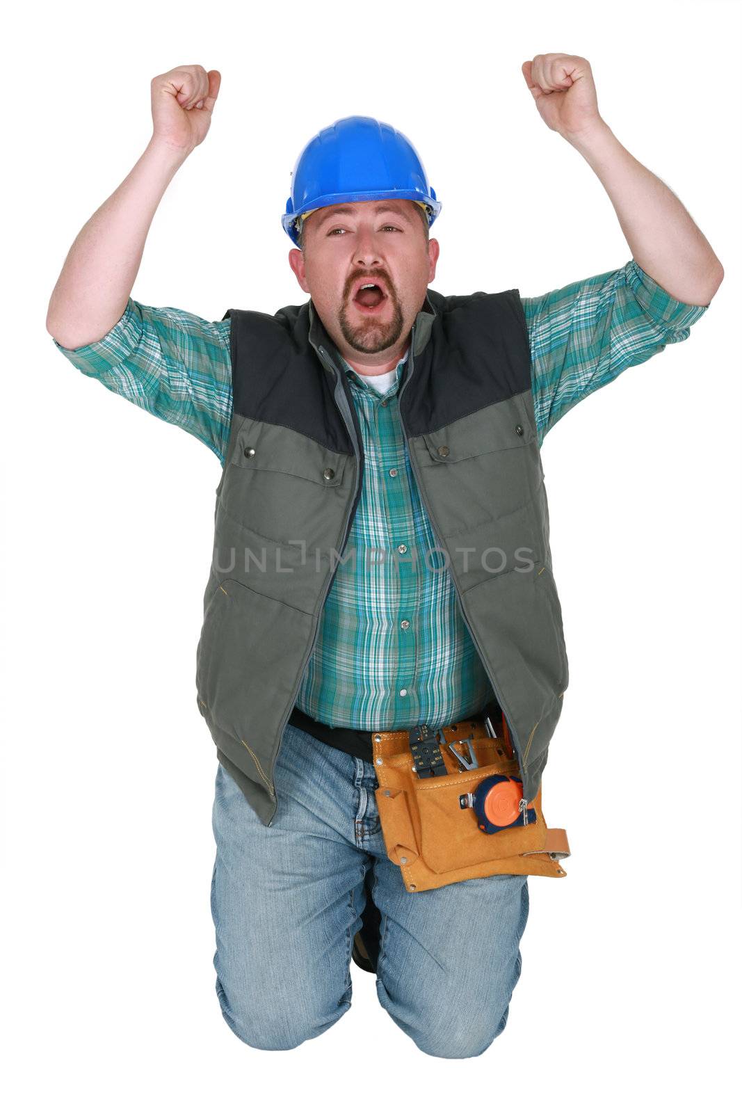 Construction worker on his knees