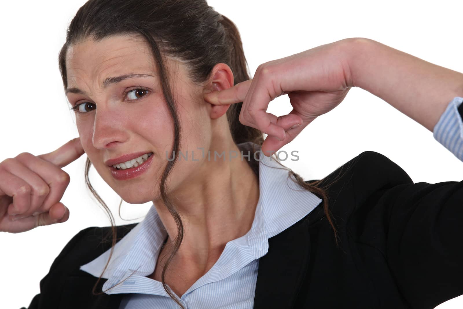 woman plugging her ears by phovoir