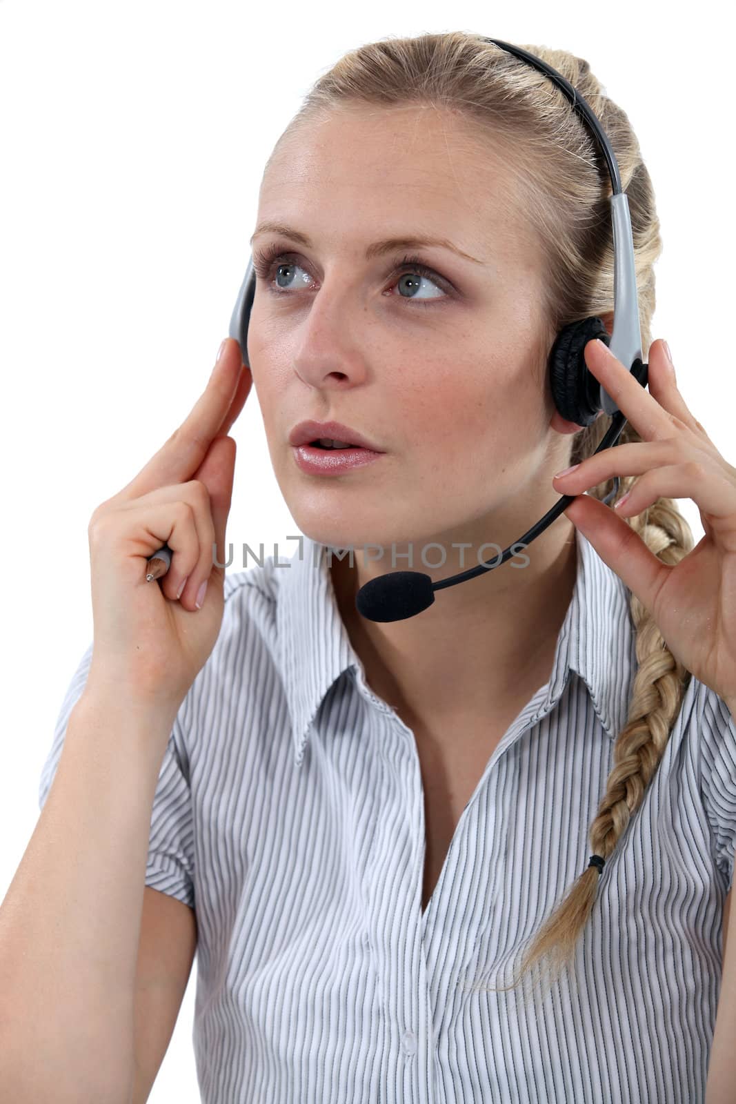 Female call-center worker taking a call from customer