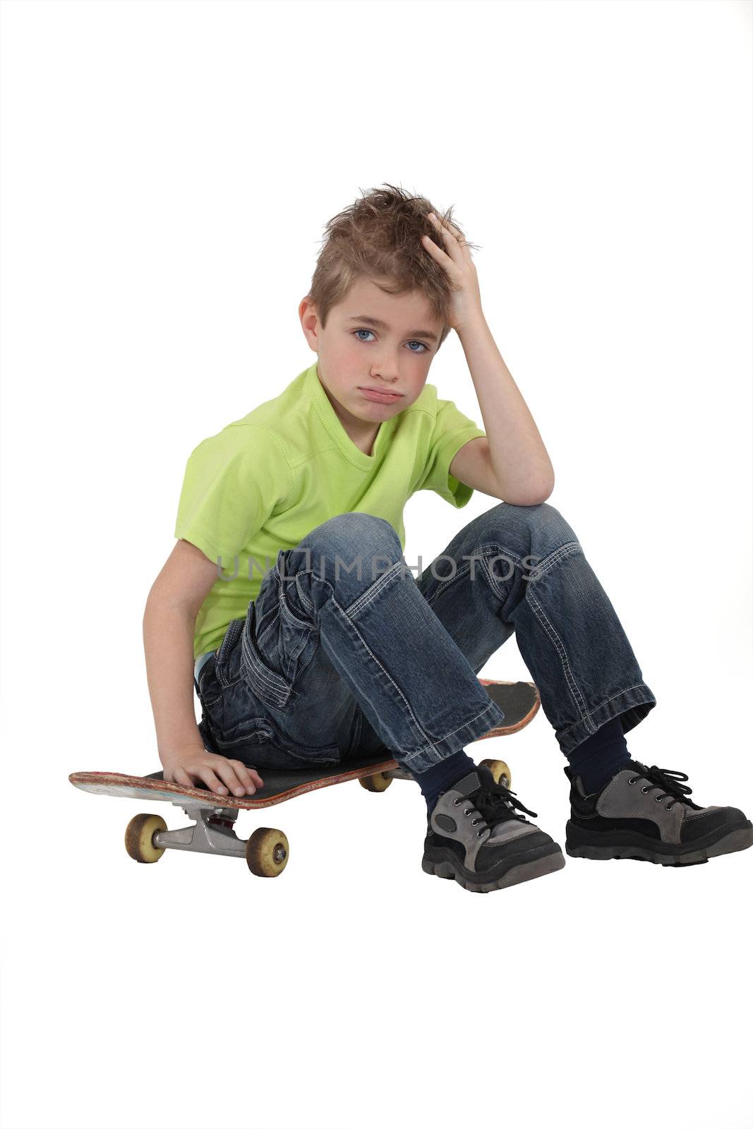 Little boy with skate board
