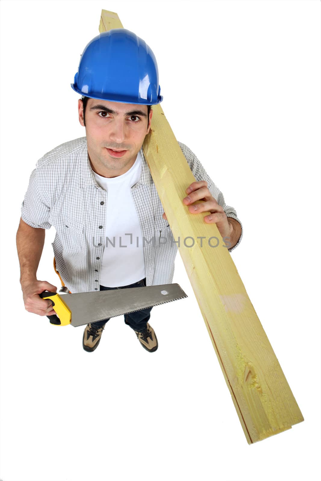 Tradesman holding planks of wood