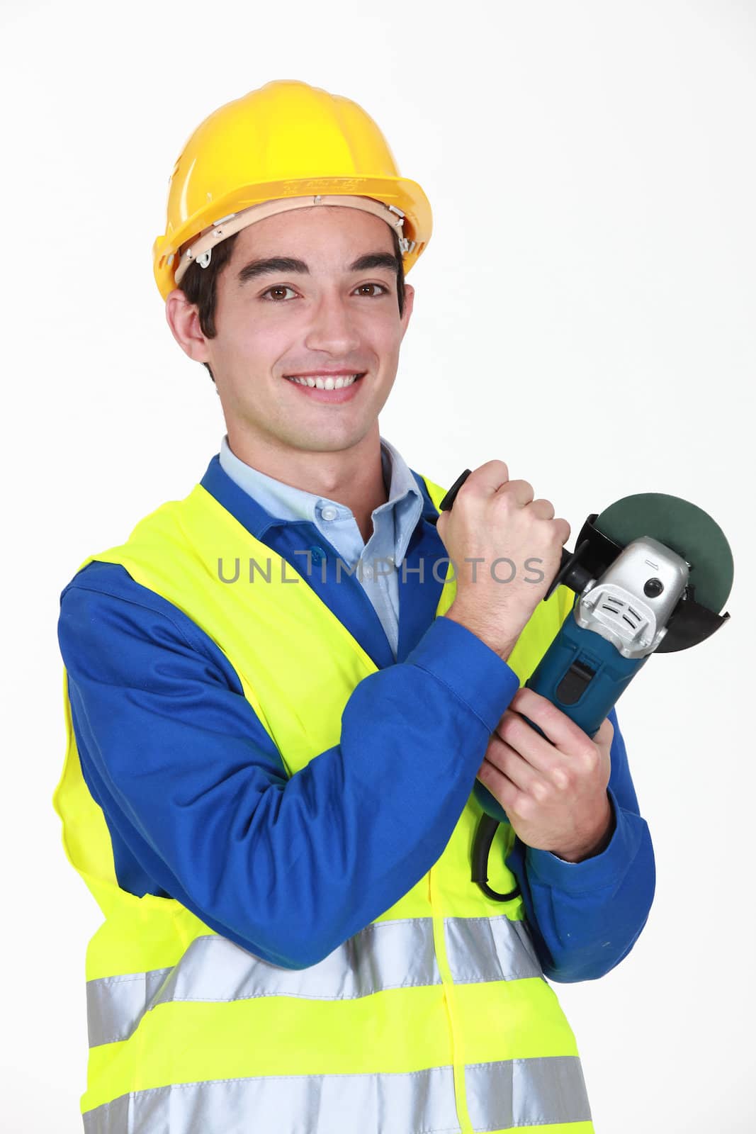 Tradesman holding an angle grinder