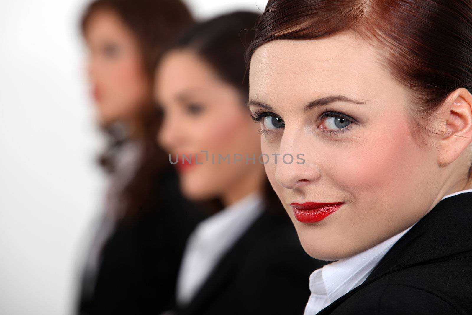 Portrait of three women in a row by phovoir