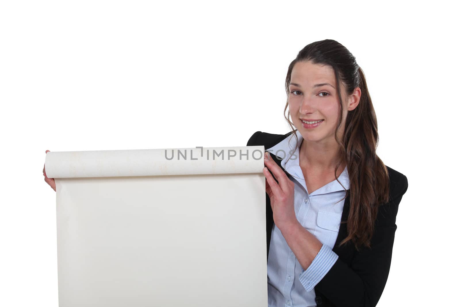 Businesswoman with a roll of blank paper by phovoir