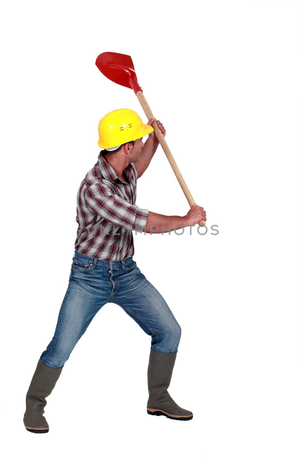 Workman brandishing a shovel on white background