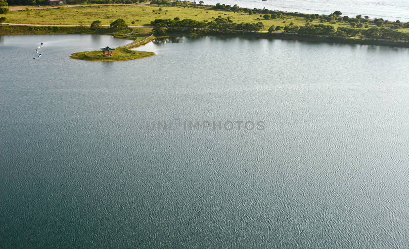 A top view of lake with kiosk