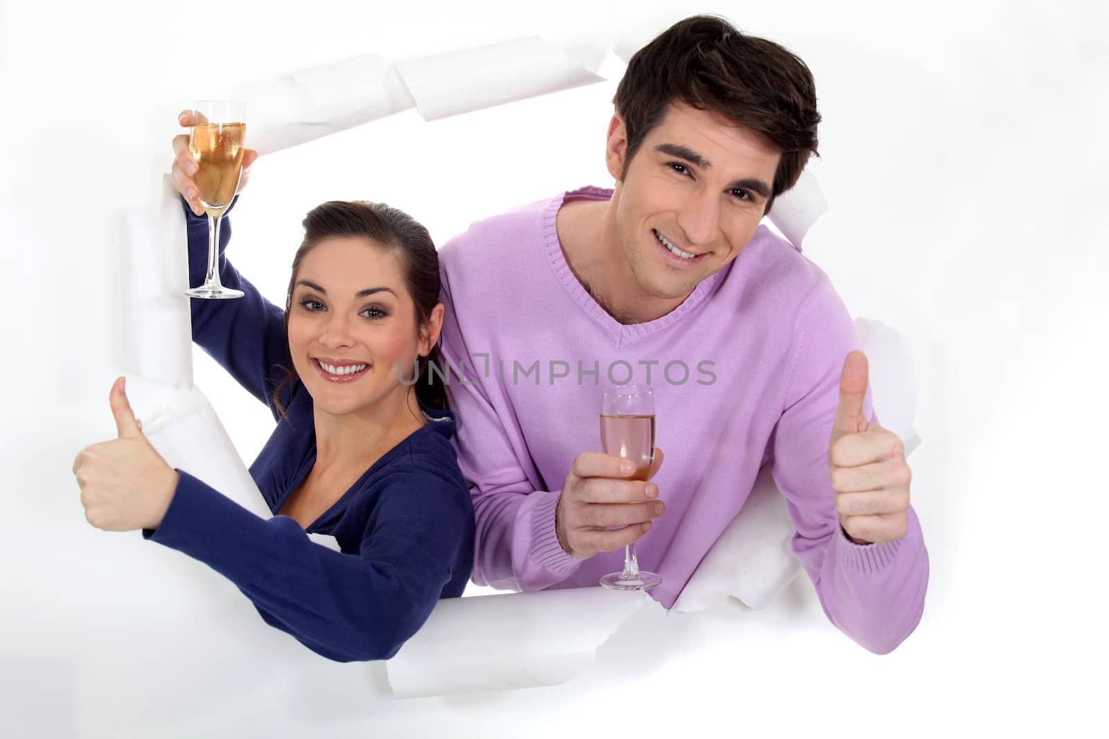 couple drinking champagne by phovoir