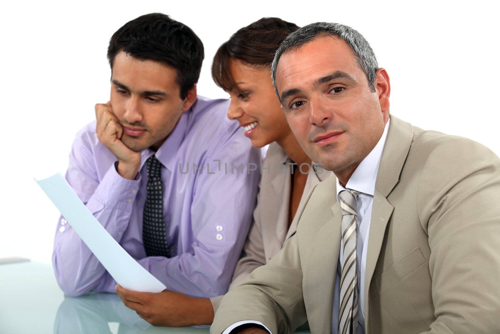 Workers sitting around a table