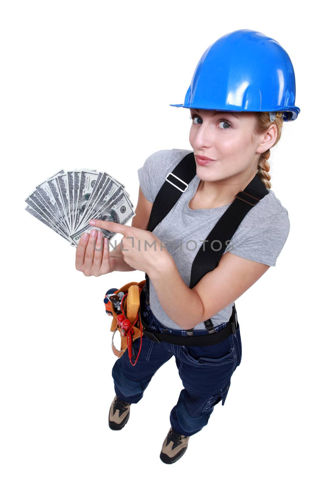 Electrician holding pay packet by phovoir
