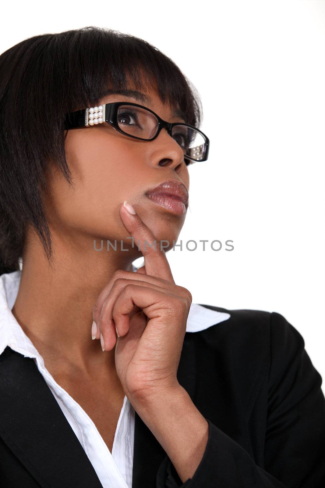 Pensive black businesswoman by phovoir