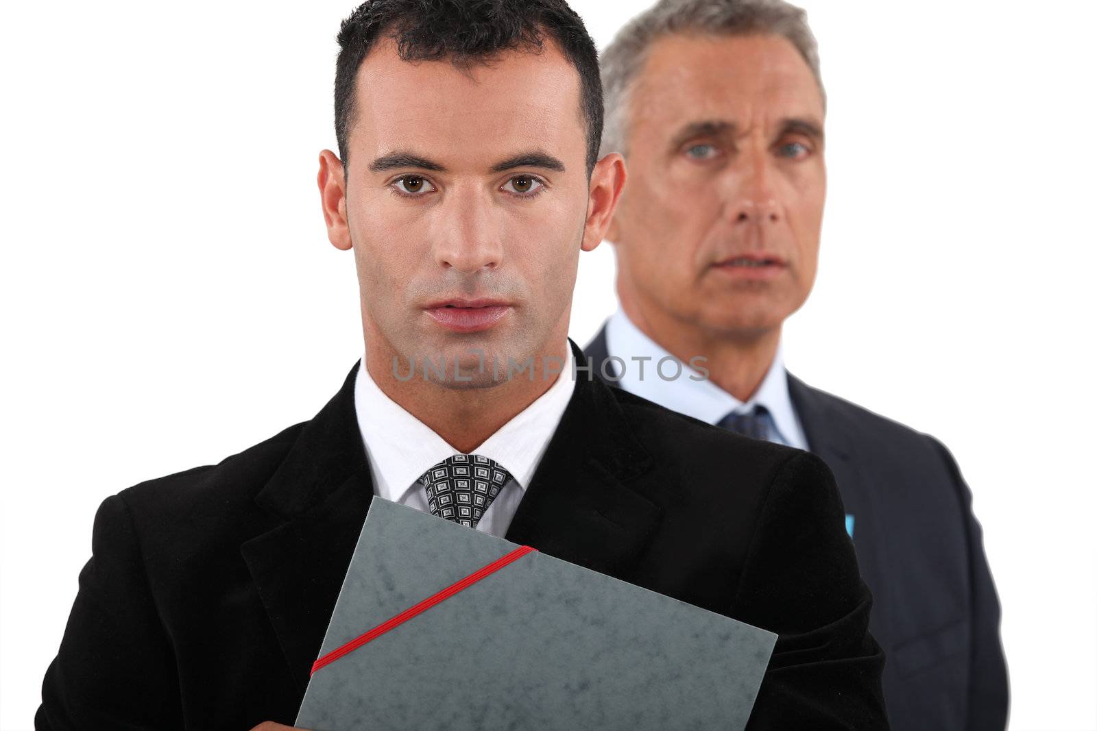 Two businessmen with folder