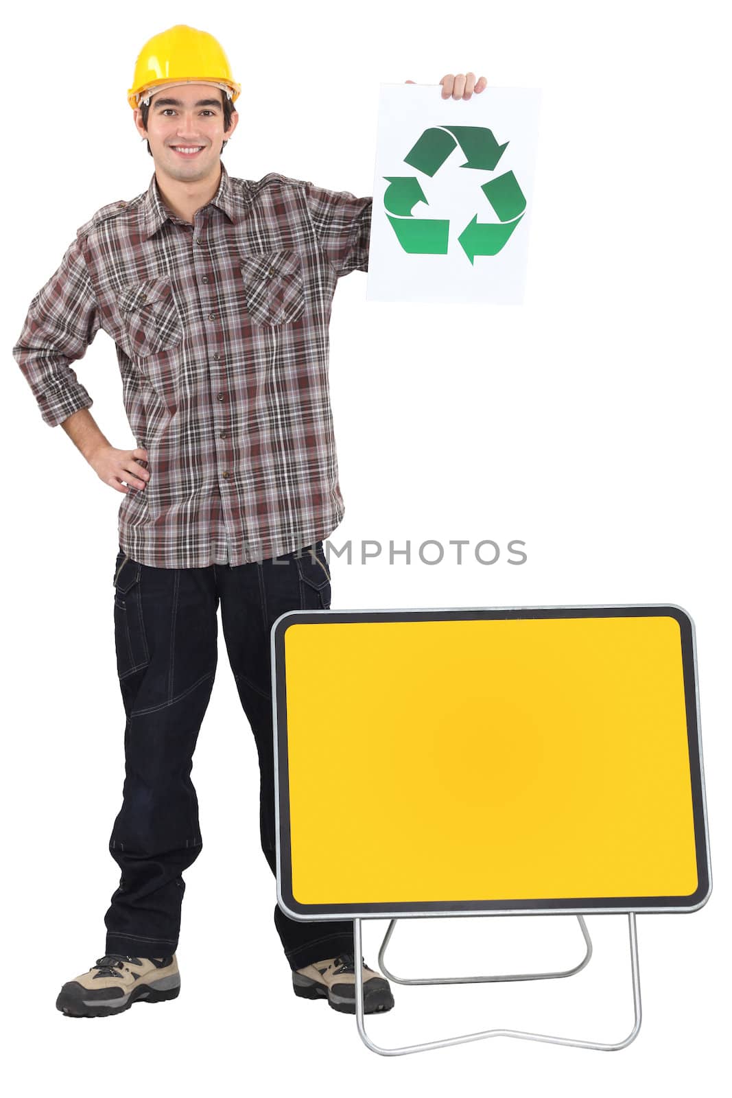 Manual worker stood with recycle poster by phovoir