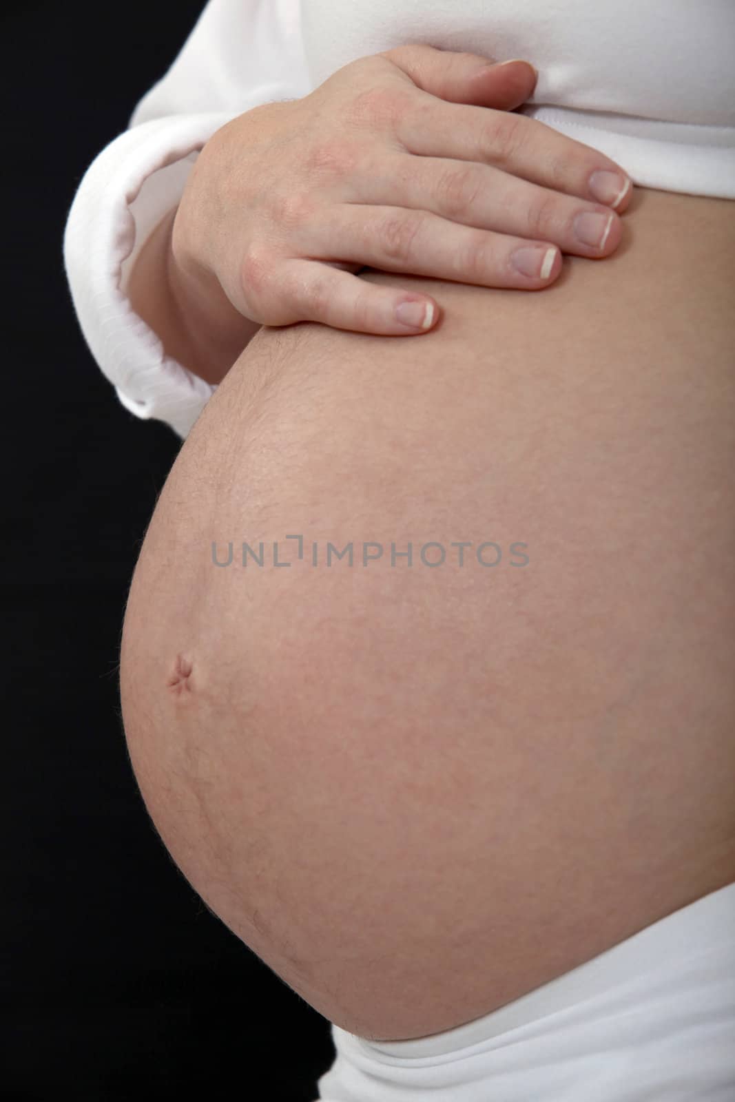 Belly of pregnant woman by phovoir