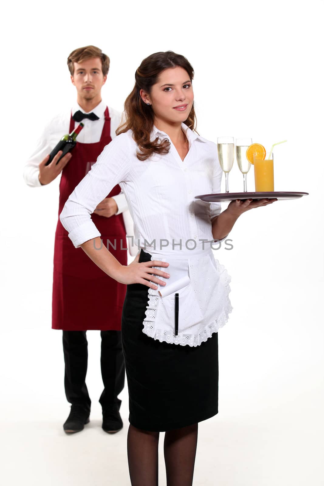 Waiter and waitress with a drinks tray