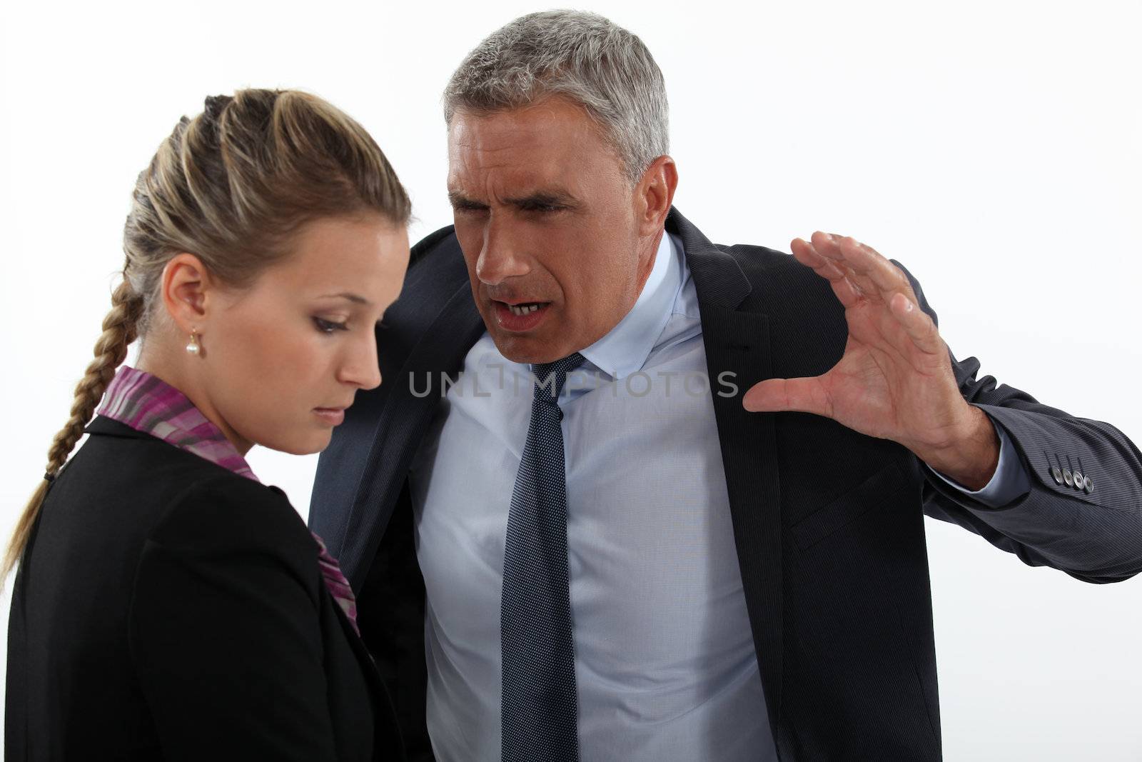 Boss shouting at female employee