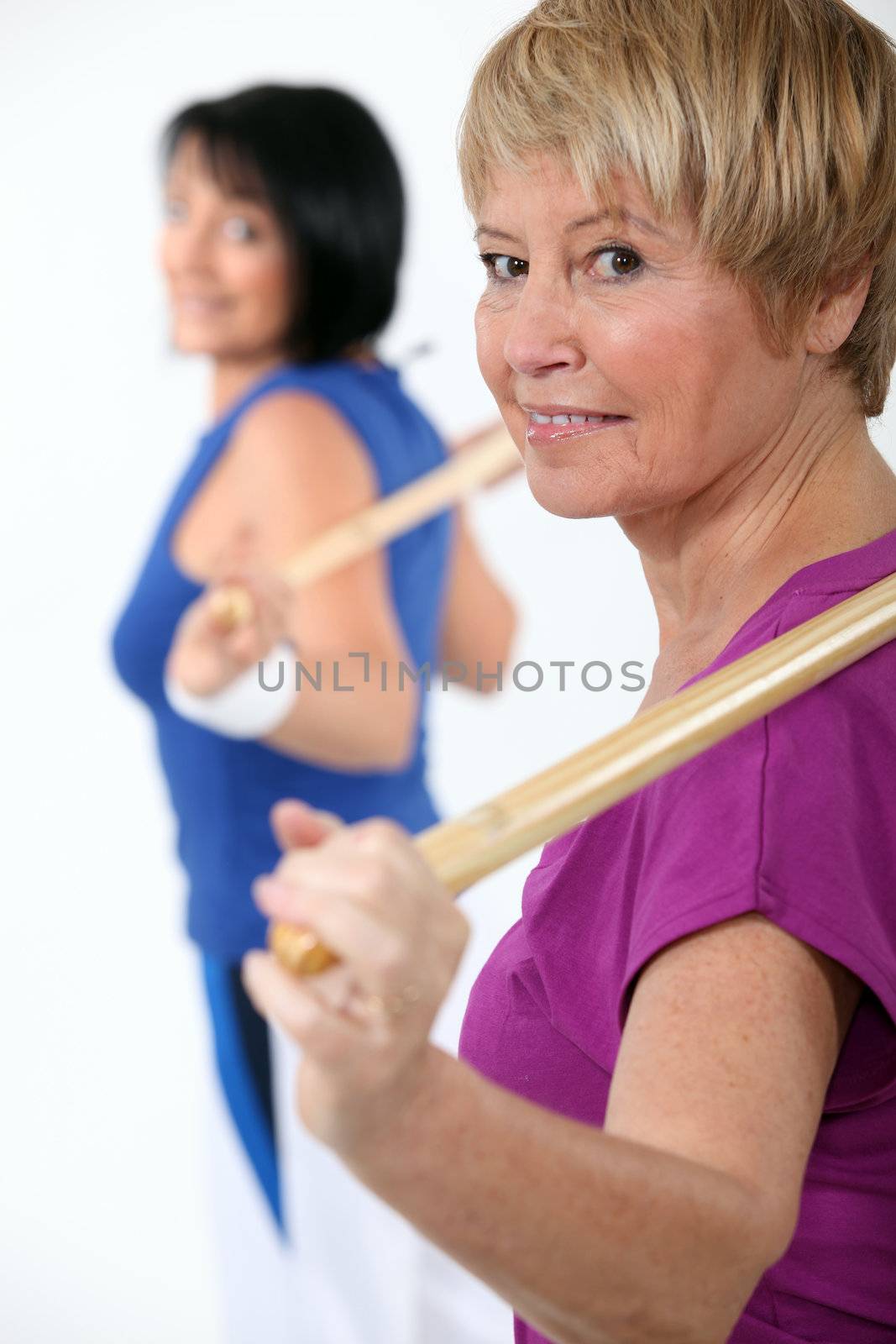 Two women in gym class