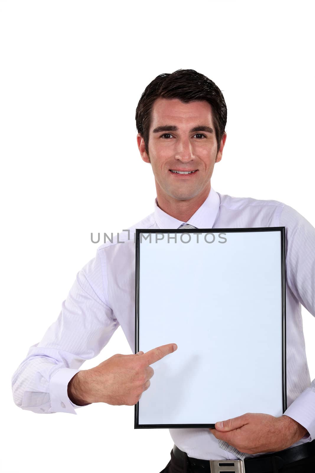 Man holding up a blank bulletin board