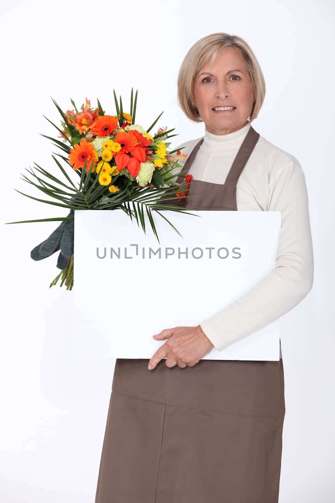 Florist with a board left blank for your message by phovoir