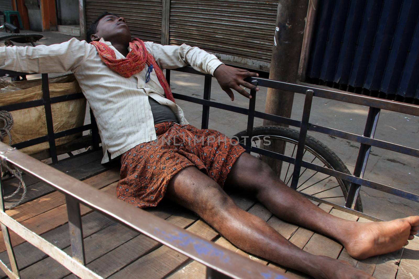 Homeless people sleeping on the footpath of Kolkata. on November 28, 2012 in Kolkata, India.