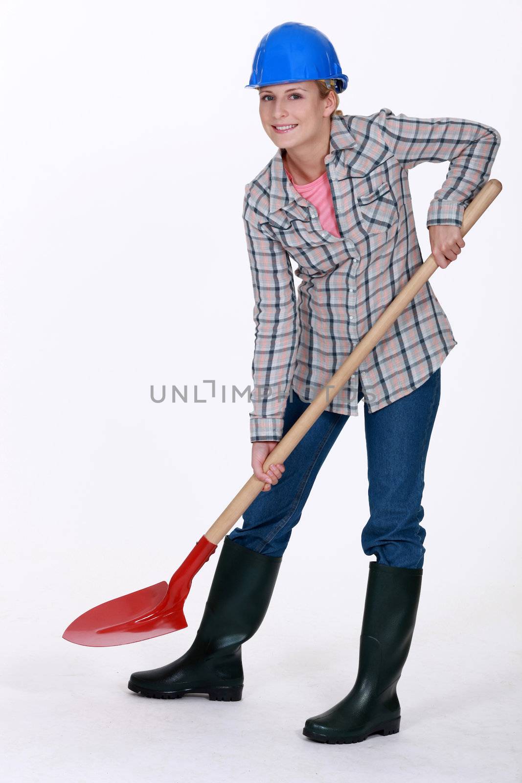 Woman using spade