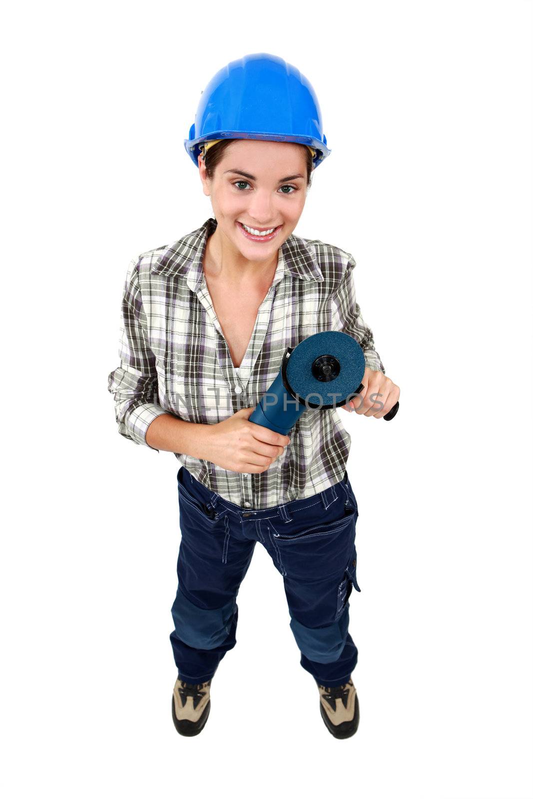 Handywoman with disc grinder by phovoir