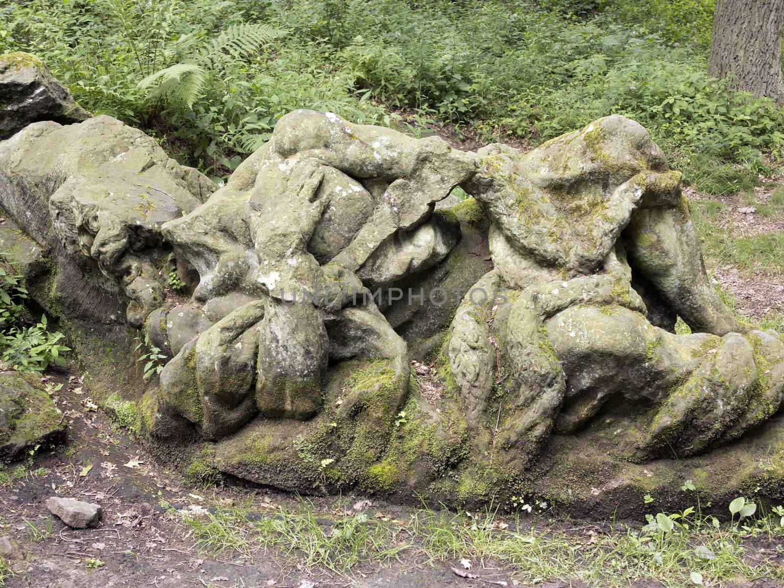 Kuks Forest Sculptures - Sleeping Mary Magdalena - detail of the Baroque sculpture by Matthias Bernard Braun in the Bethlehem of Braun, Kuks, Czech Republic. The Bethlehem of Braun (Czech: Braunuv Betlem) is a complex of Baroque statues and relieves carved by famous sculptor Matthias Bernard Braun directly in sandstone rocks in the forest near complex Kuks Hospital in Northern Bohemia, Czech Republic. Part of the sculptures in the New Forest is ranked the best works of Czech Baroque sculpture. Since 2002, the area is protected as a National Historic Landmark and were listed in the 2000 World Monuments Watch by the World Monuments Fund.
