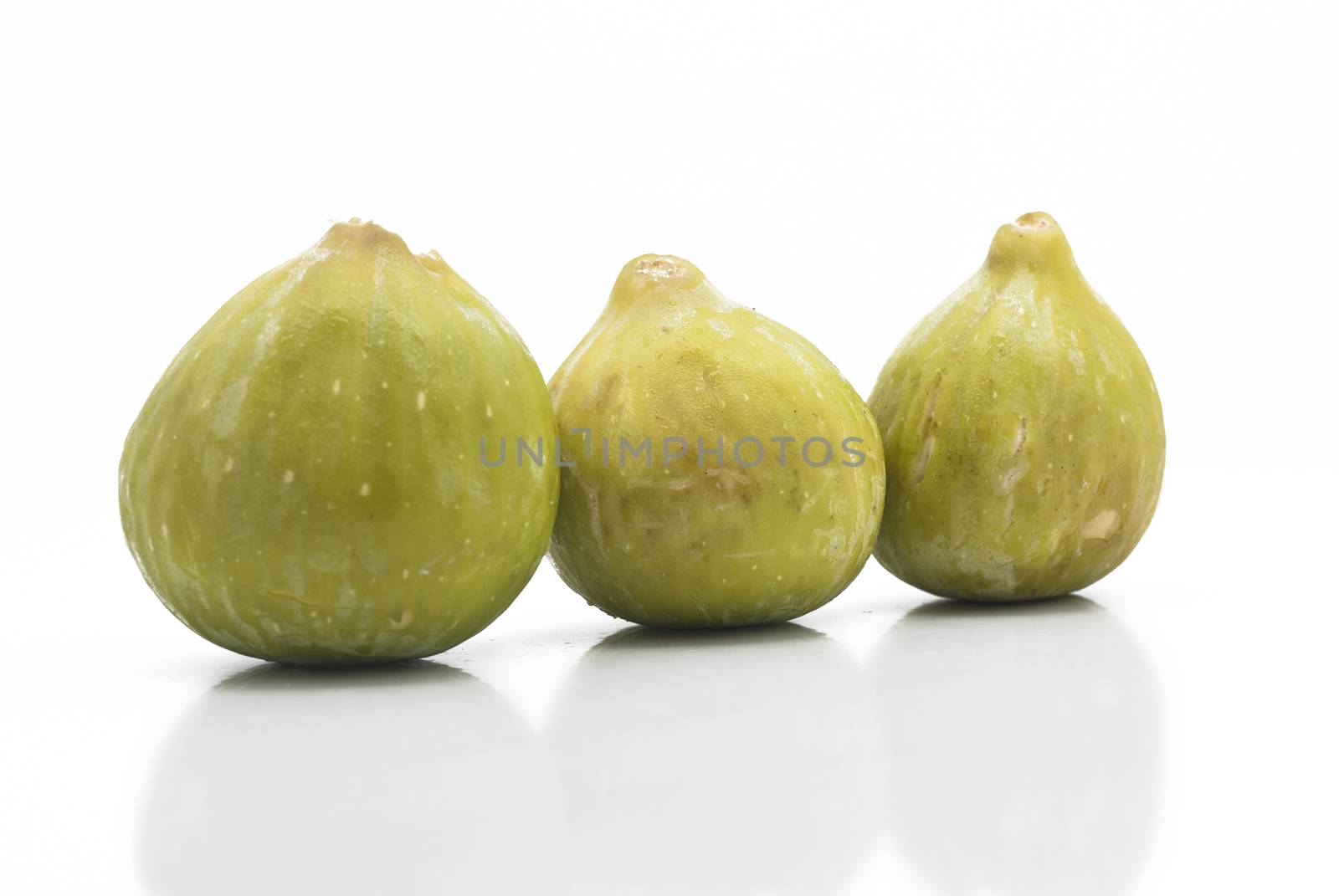 Fresh Green figs isolated on white background