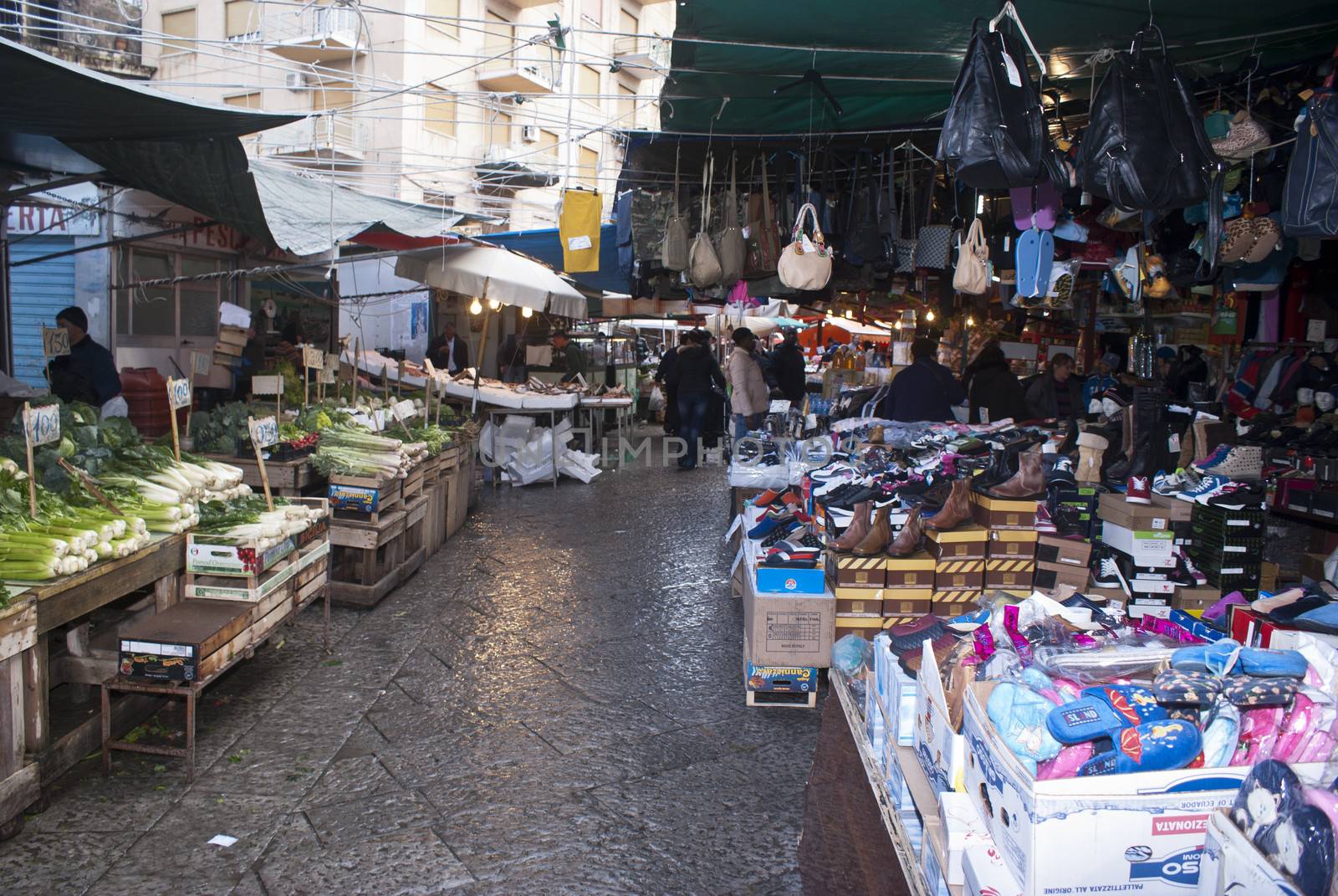 PALERMO - DECEMBER 22: Street of local market in Palermo, called Ballaro. This market is also tourist attraction in Palermo, Sicily, Italy on Dec. 22, 2012