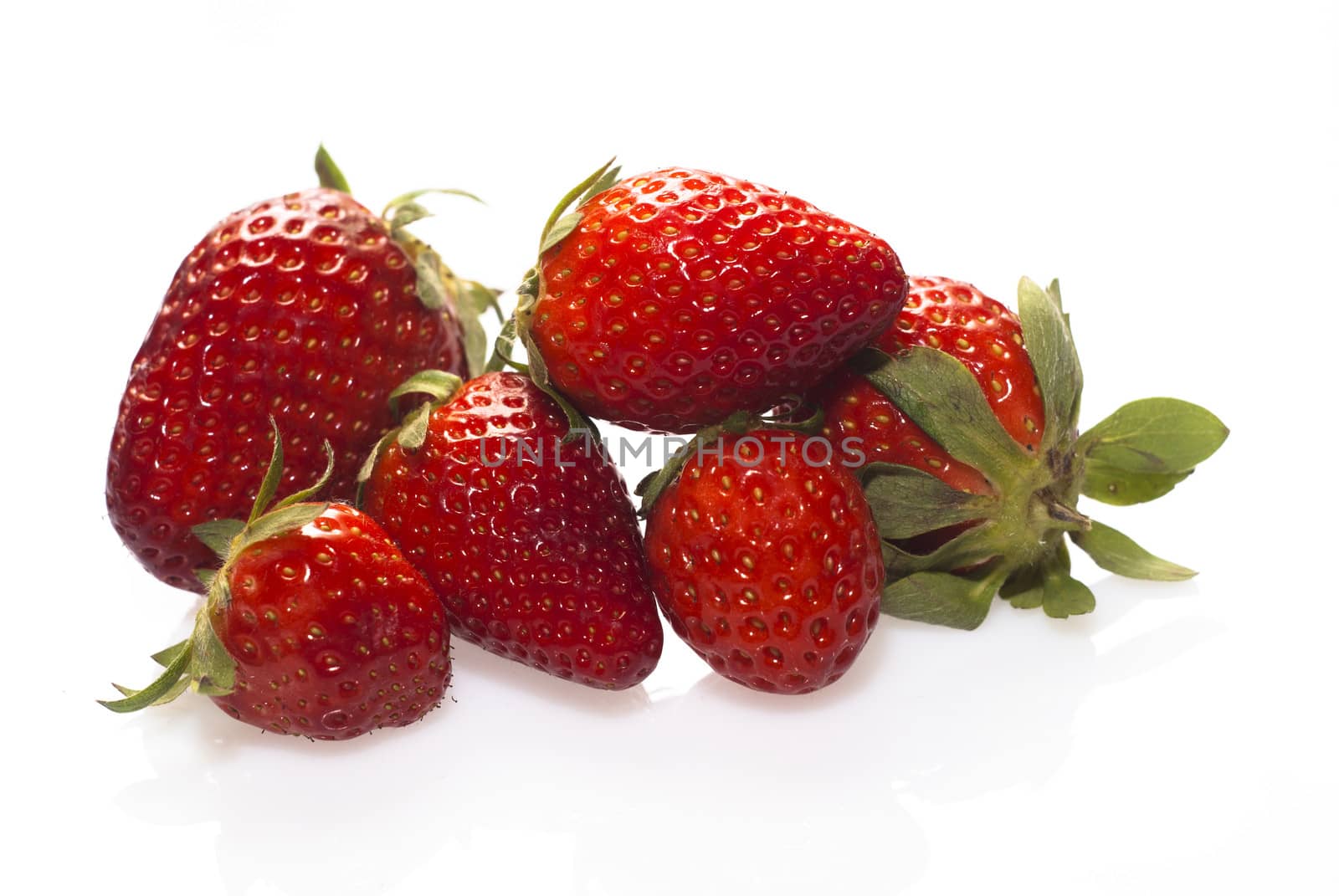 Strawberries isolated over white by gandolfocannatella
