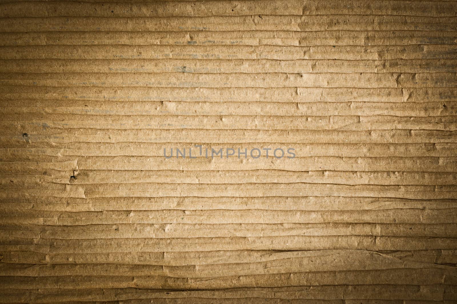 Textured grunge of cardboard with natural fiber parts