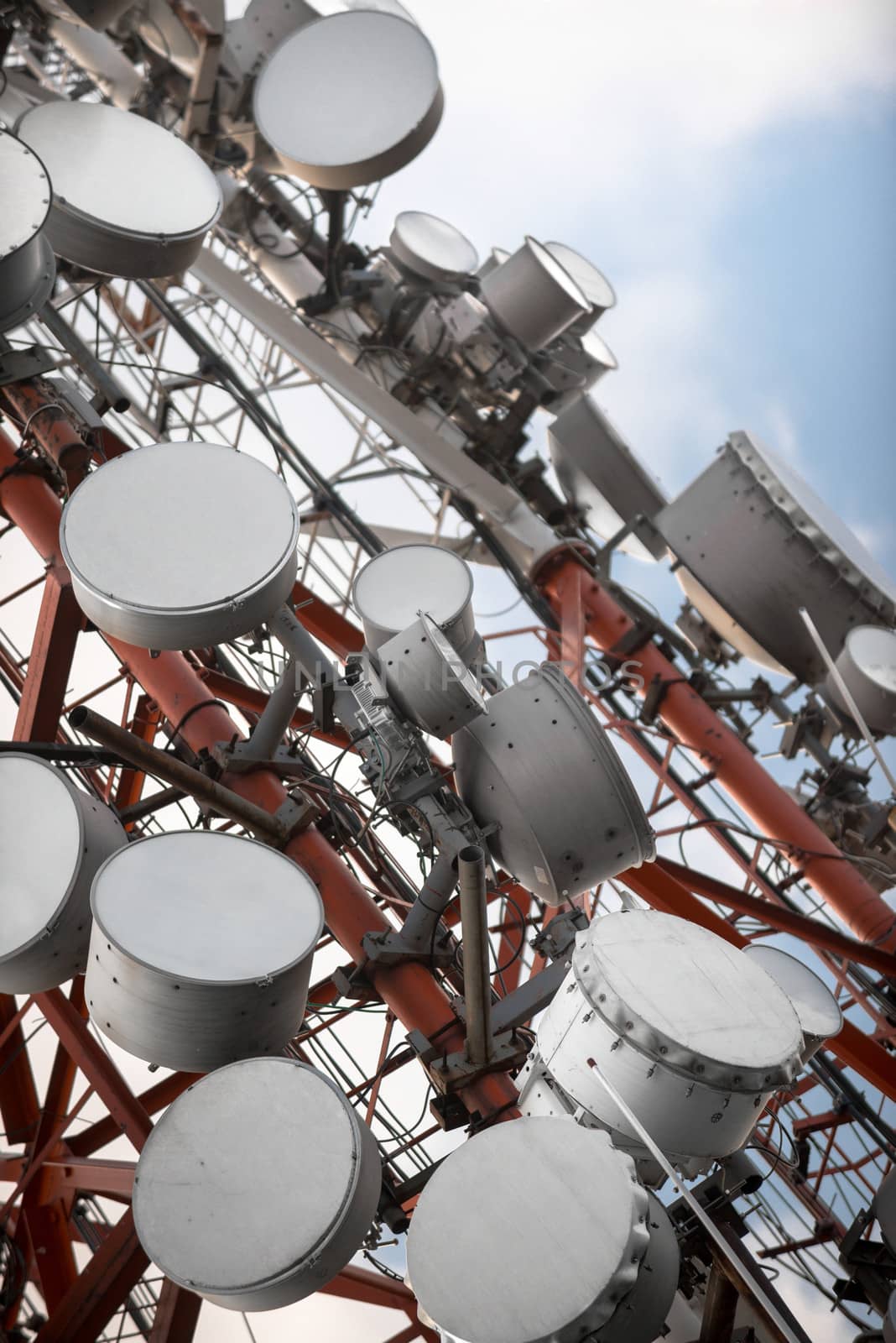 Large Communication tower against sky by svedoliver