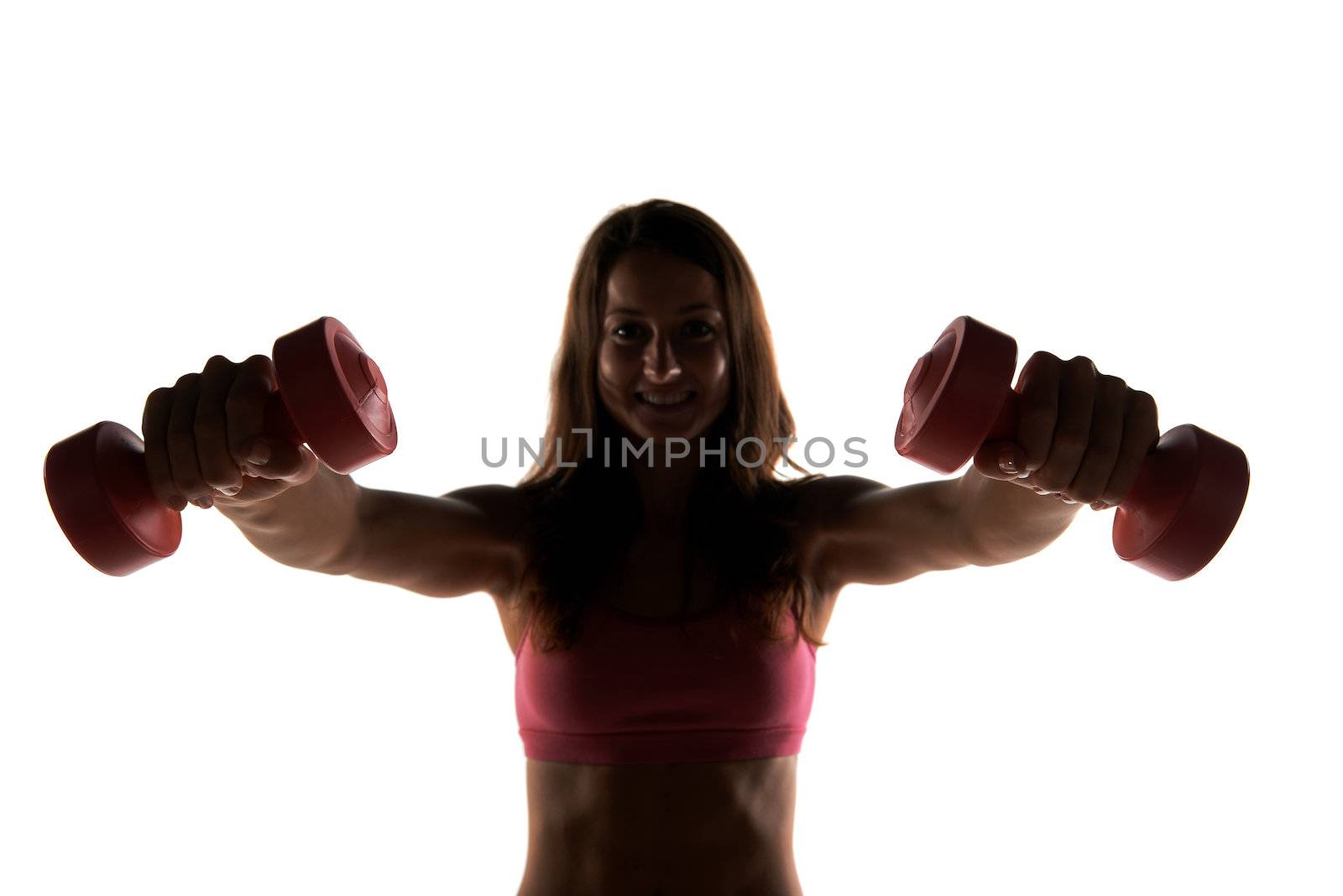 Silhouette Fitness instructor in a studio working out