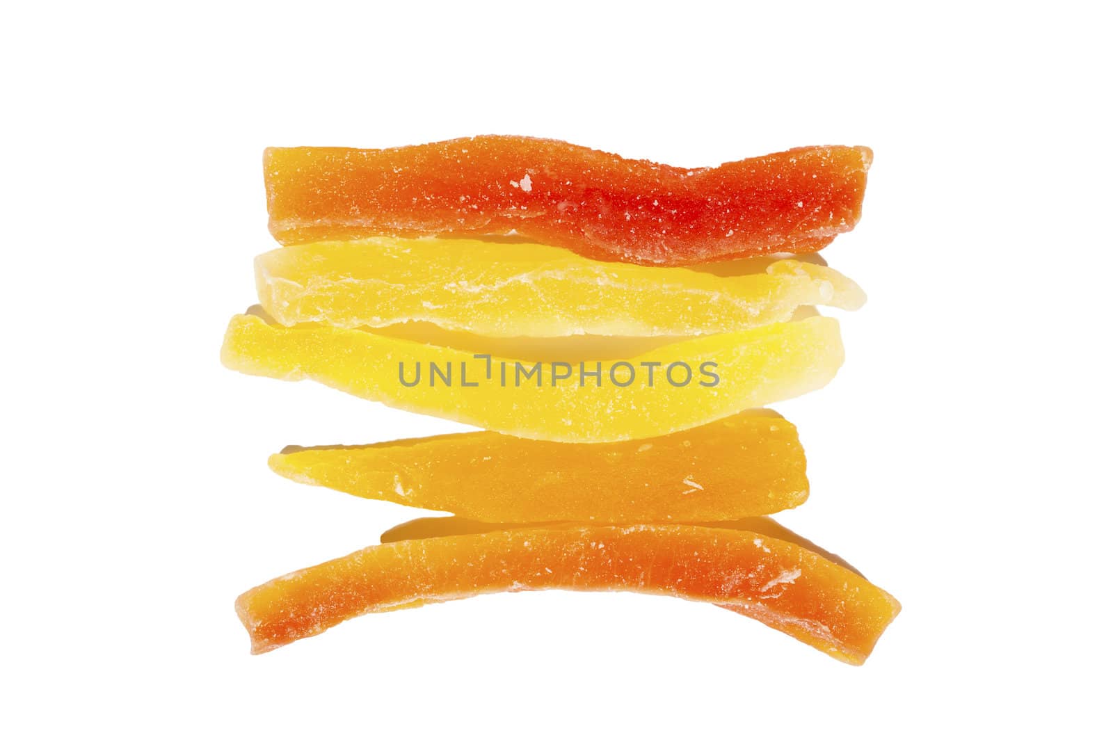 Sweet dried multicolored papaya in sugar isolated