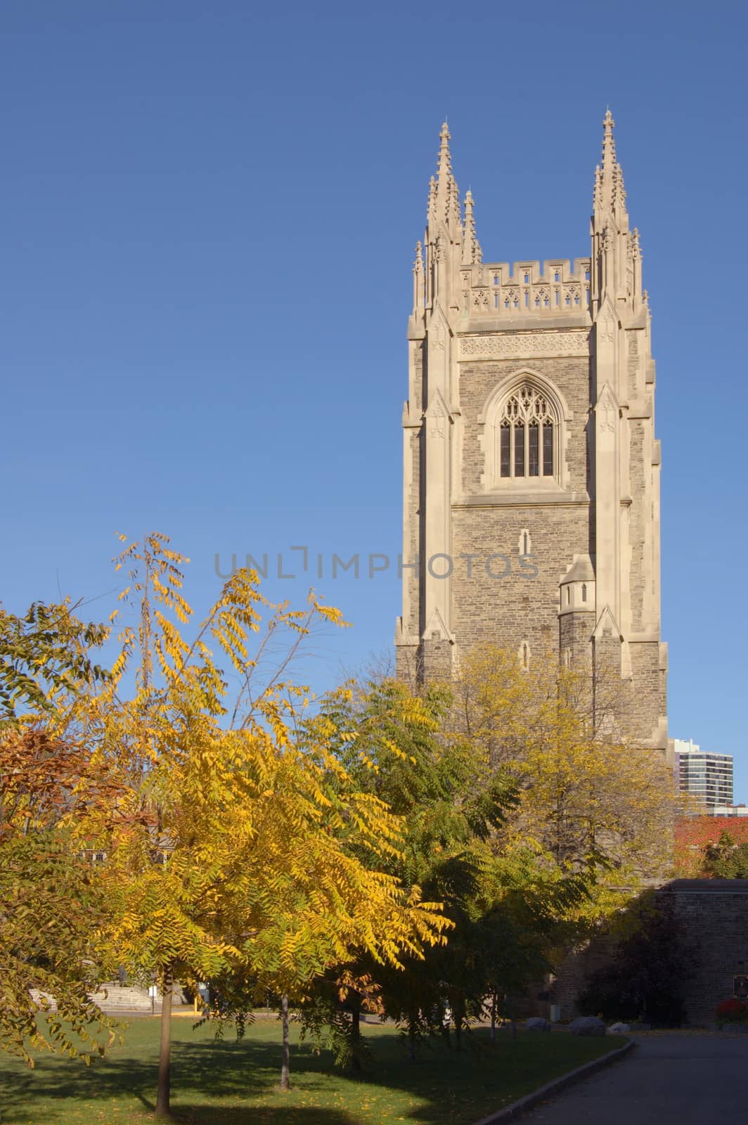 Brick stone tower on blue sky background