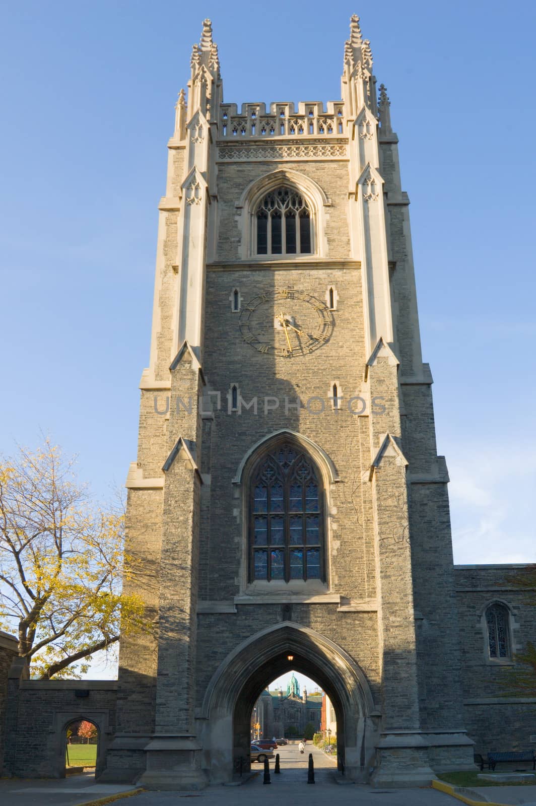 Brick stone tower on blue sky background