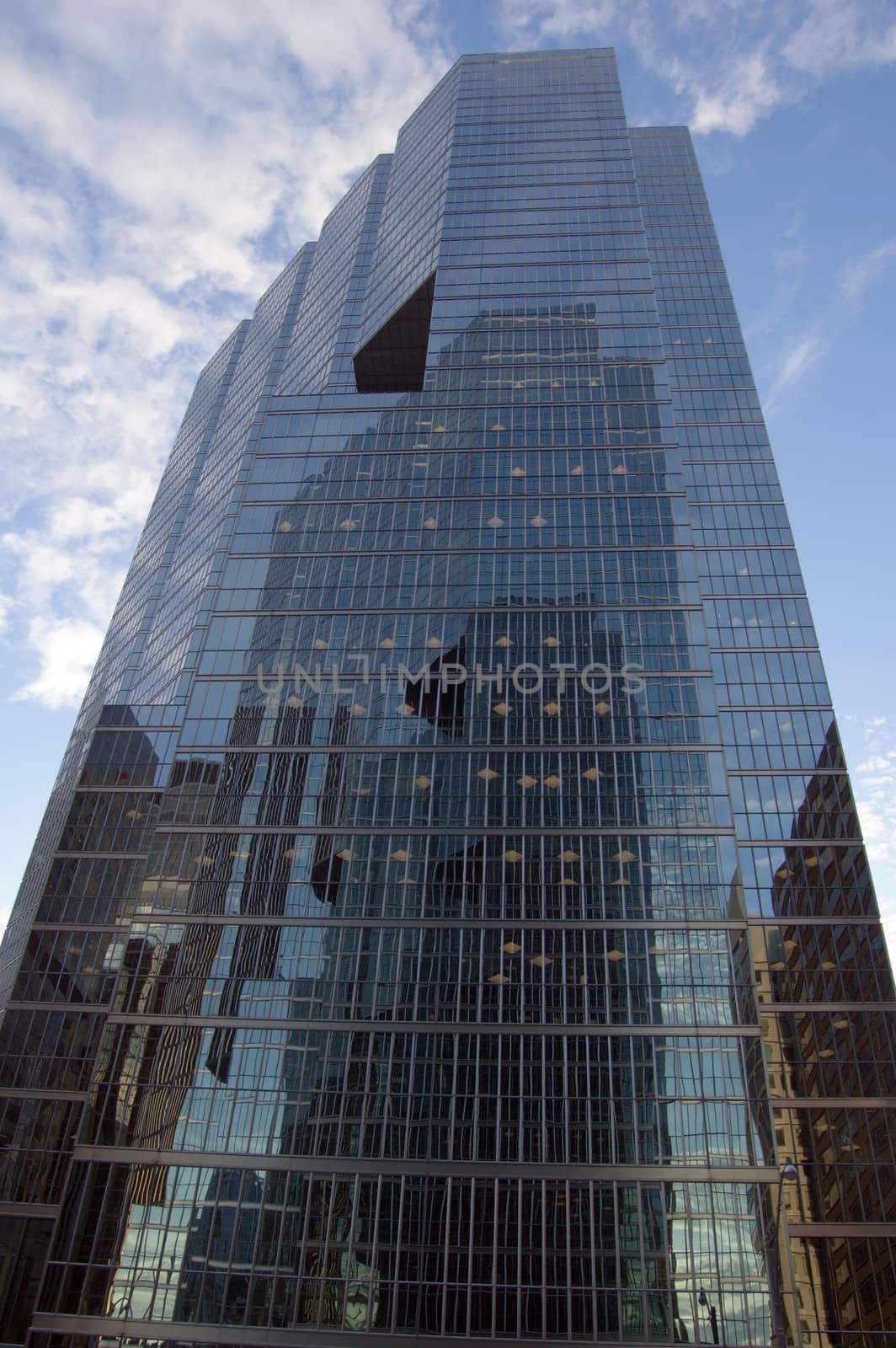 glass wall of a high-rise building in downtown Toronto