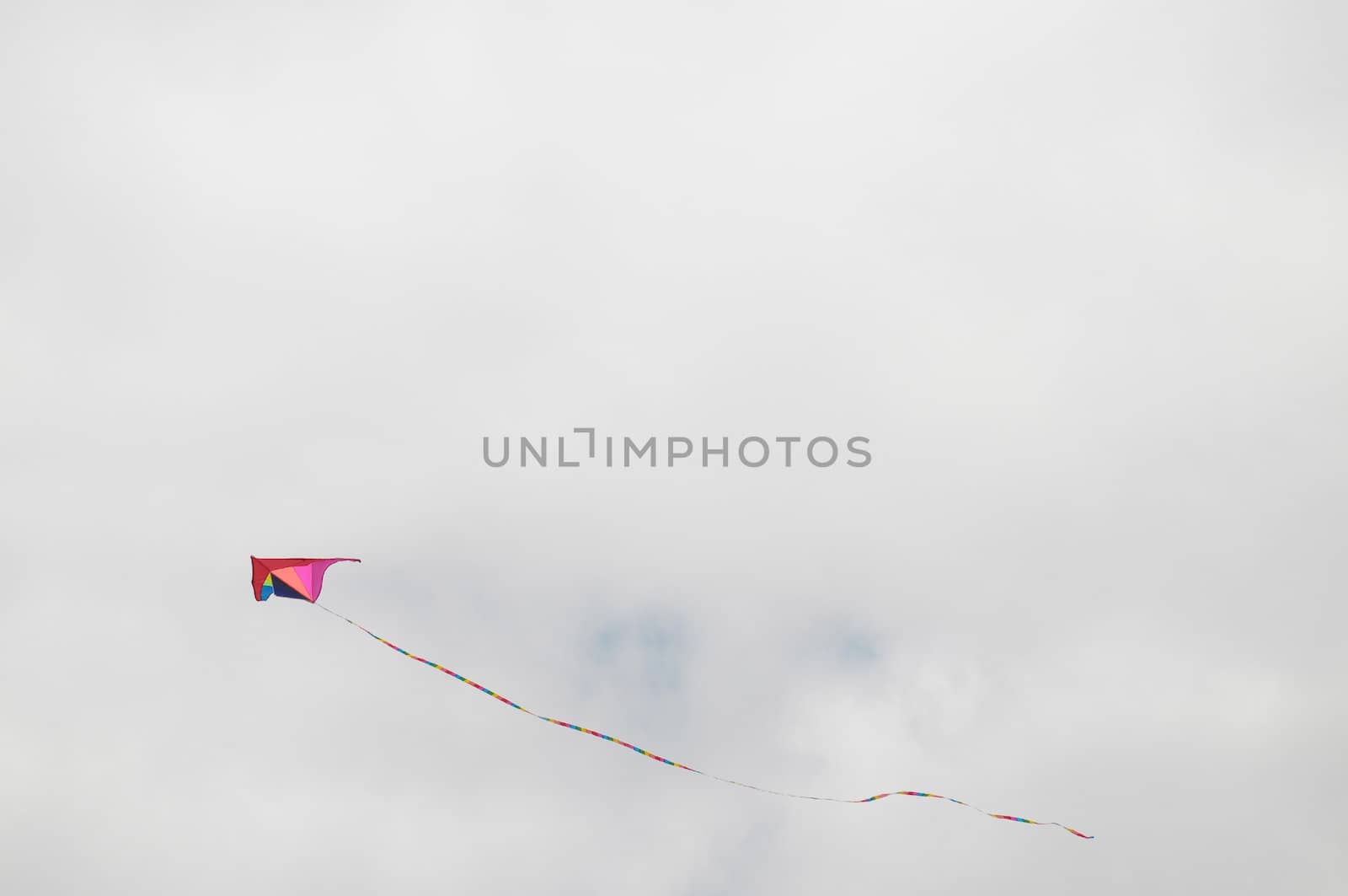 One Kite Flying over a Cloudy Sky, in Canary Islands, Spain