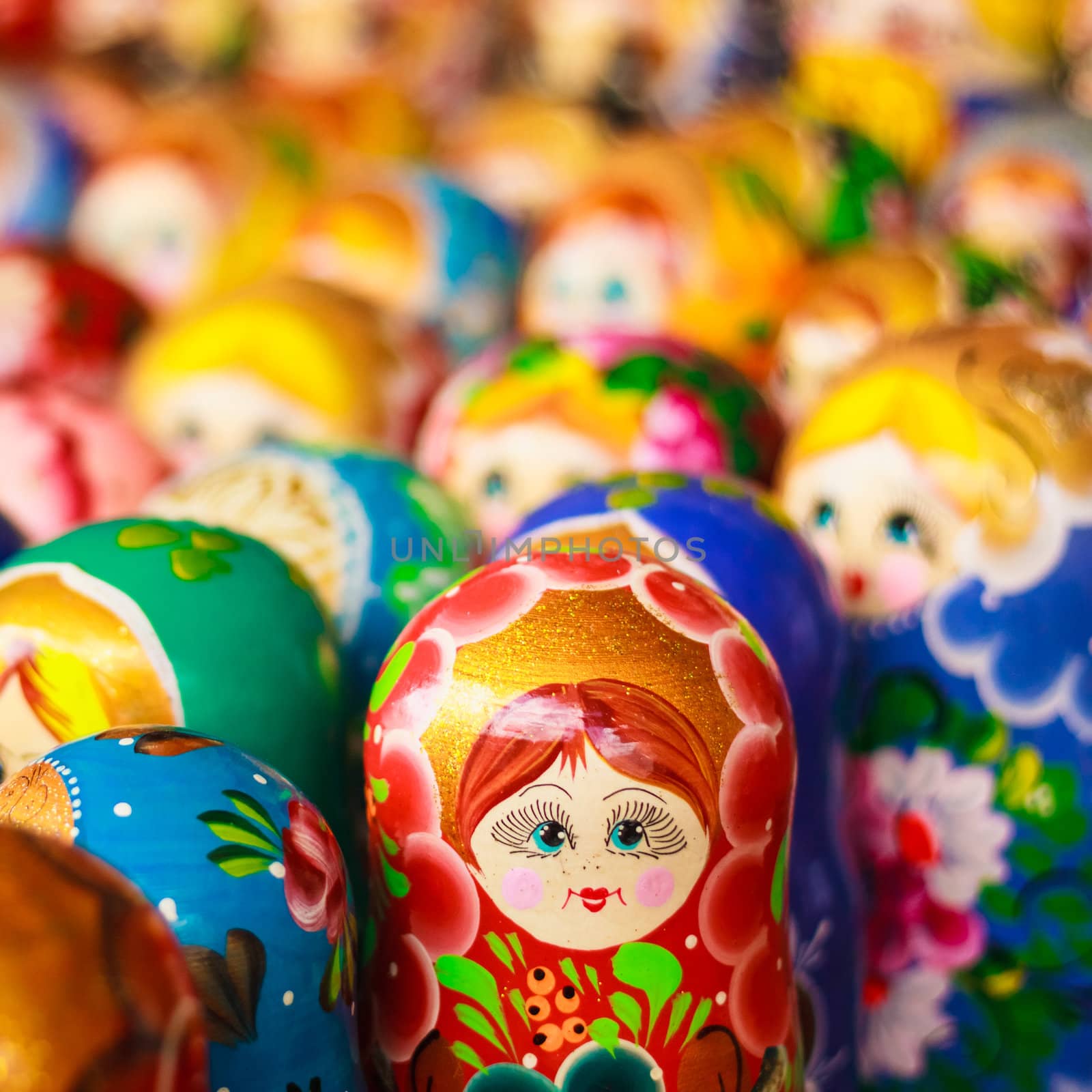 Colorful Russian nesting dolls at the market by ryhor