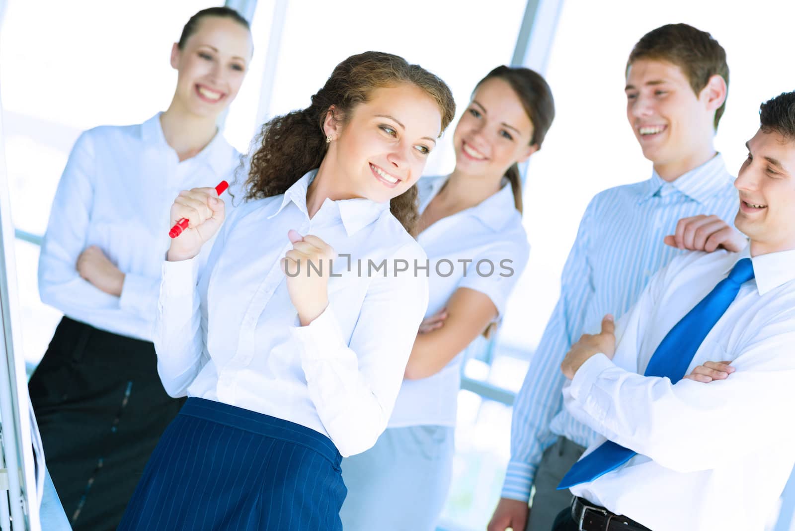 happy business woman standing next to their counterparts outside the flipchart achievements in business