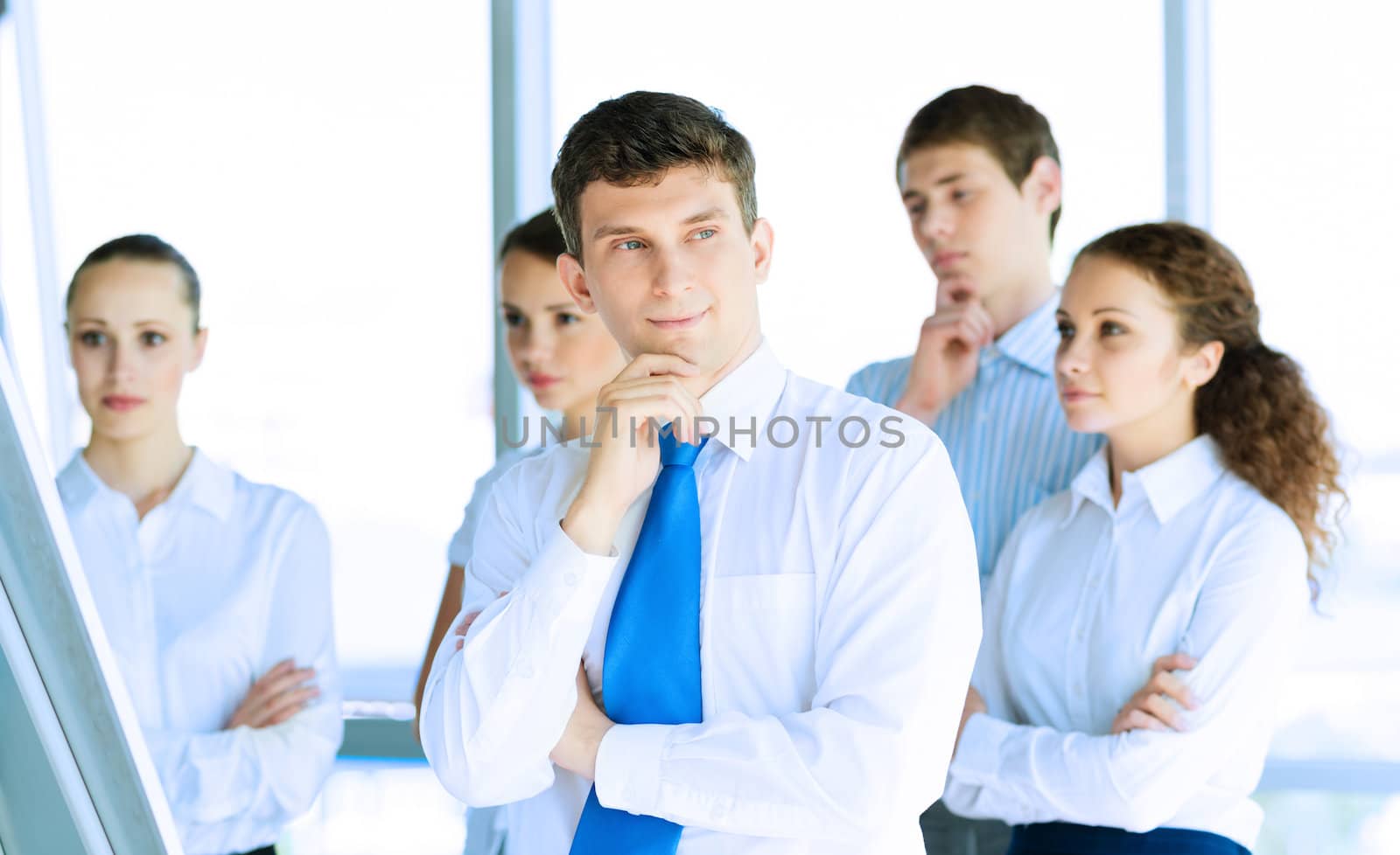 businessmen are meeting near the flipchart by adam121