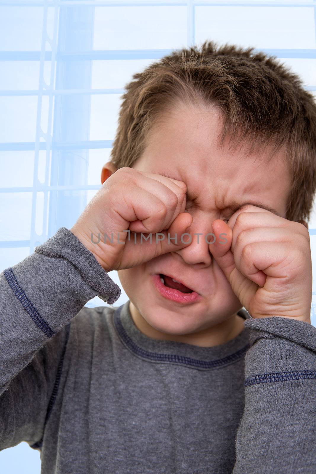 Kid Crying with Hands on his Face by coskun
