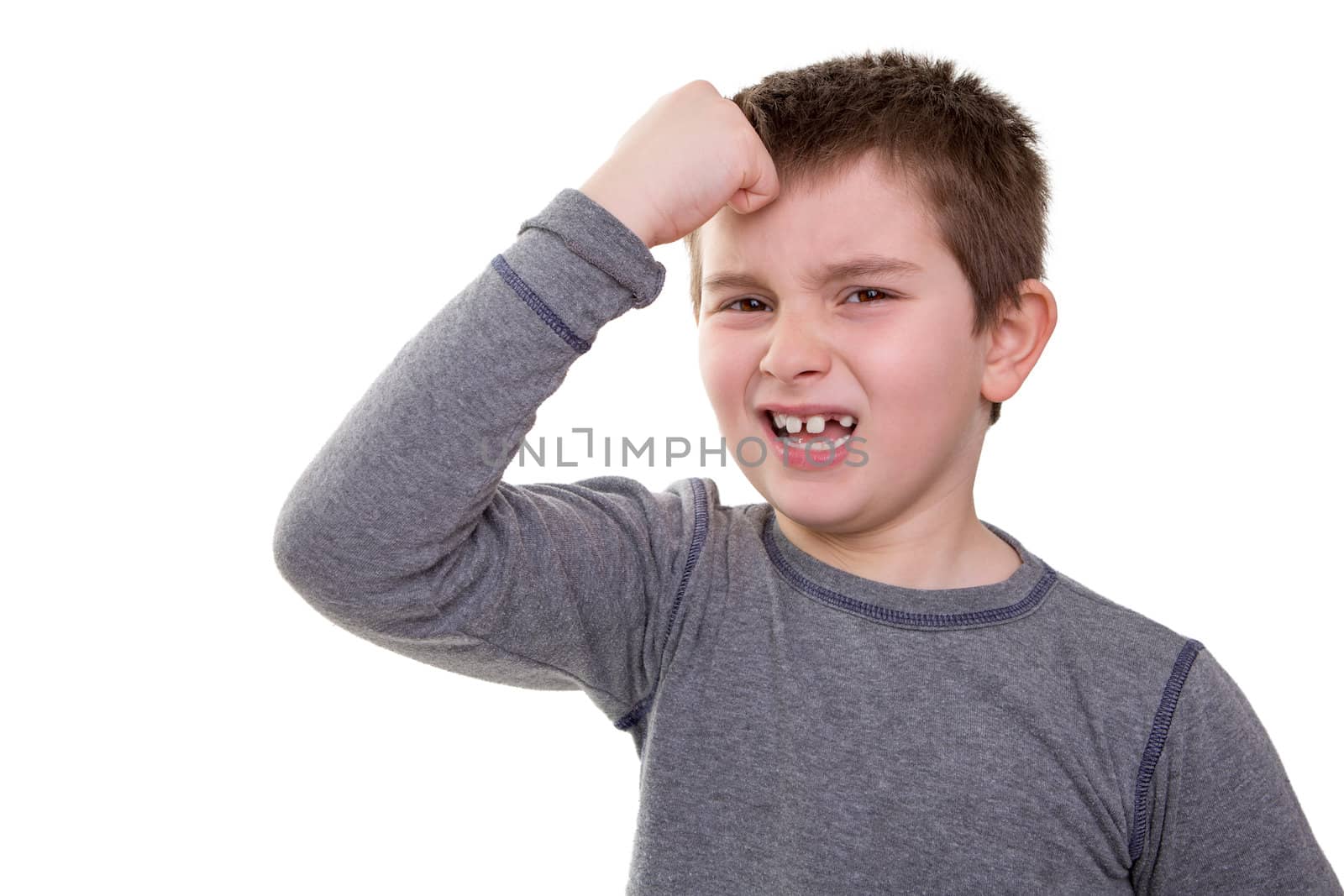 Kid knocking his head  looks very regretful about what he did