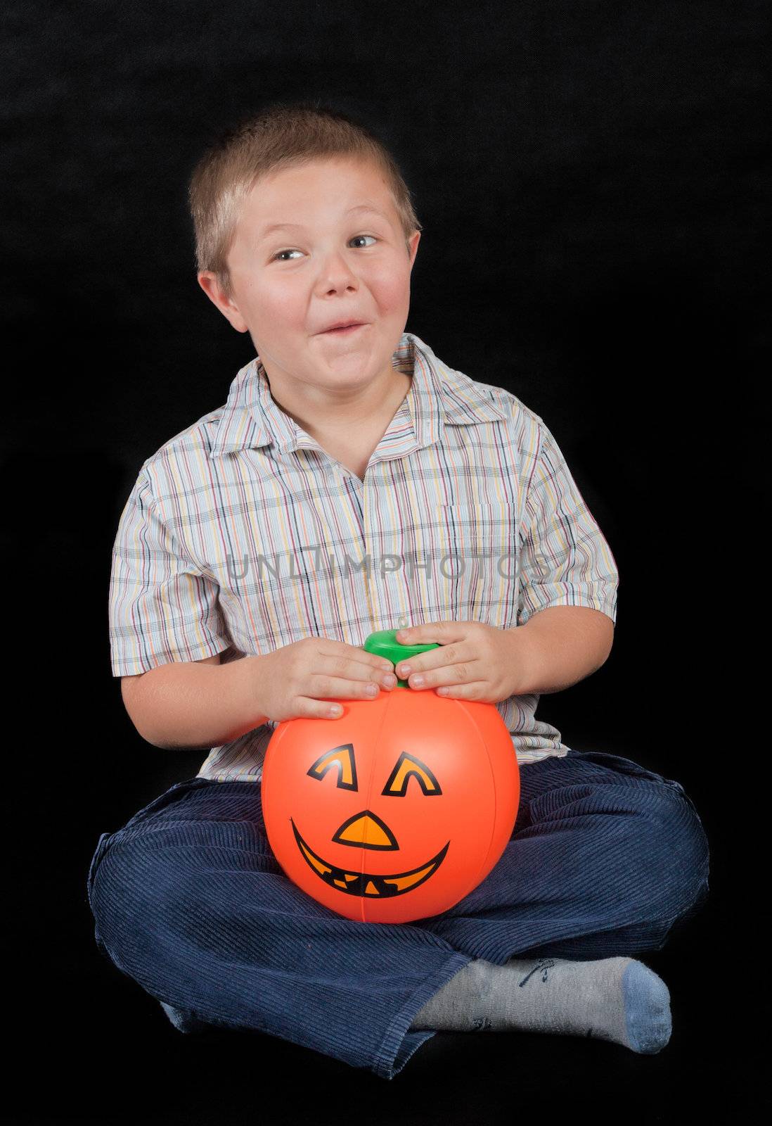 boy with the pumpkin - on black