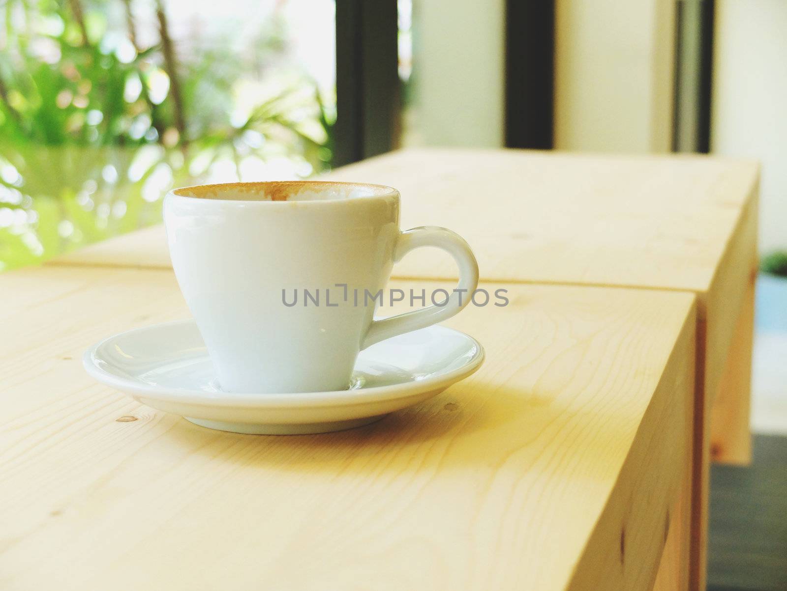 a cup of coffee at coffee shop  by nuchylee
