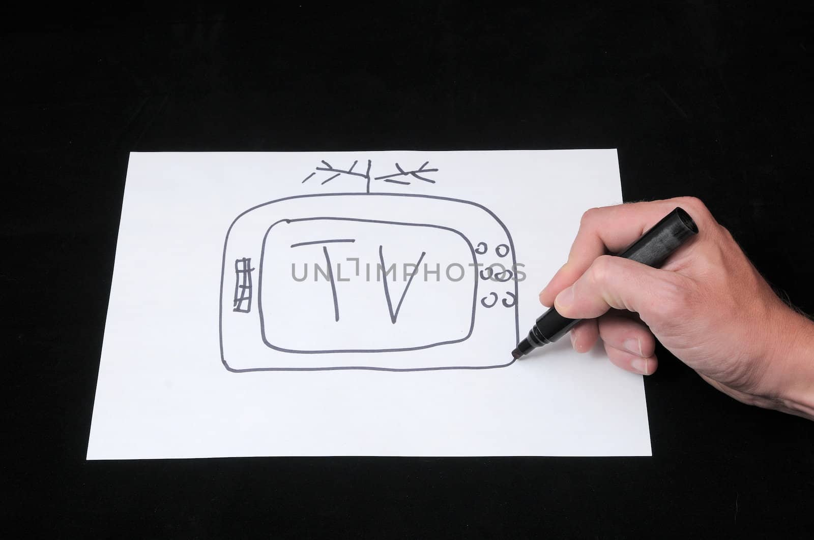 A Caucasian Male Hand Drawing on a White Paper